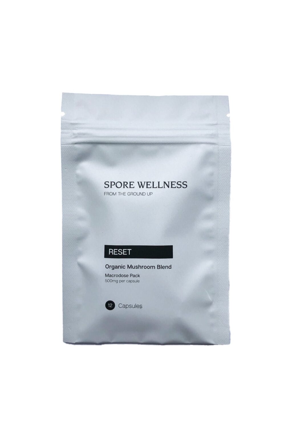 Spore Wellness brand Reset model wellness supplement container with custom graphic label